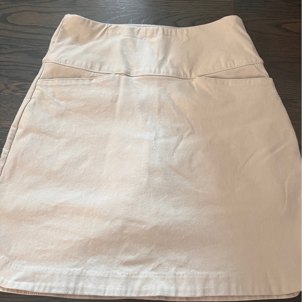 Small beige skort